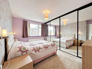 Bedroom One- click for photo gallery